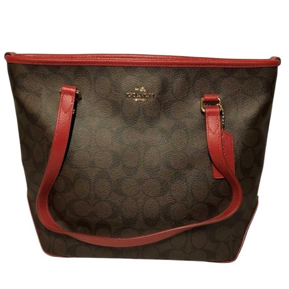 COACH GALLERY PURSE. Brown signature canvass. 
Gold hardware. Medium size. NEW